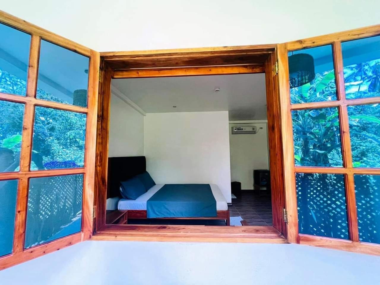 White Bada Guesthouse Siquijor Ruang foto