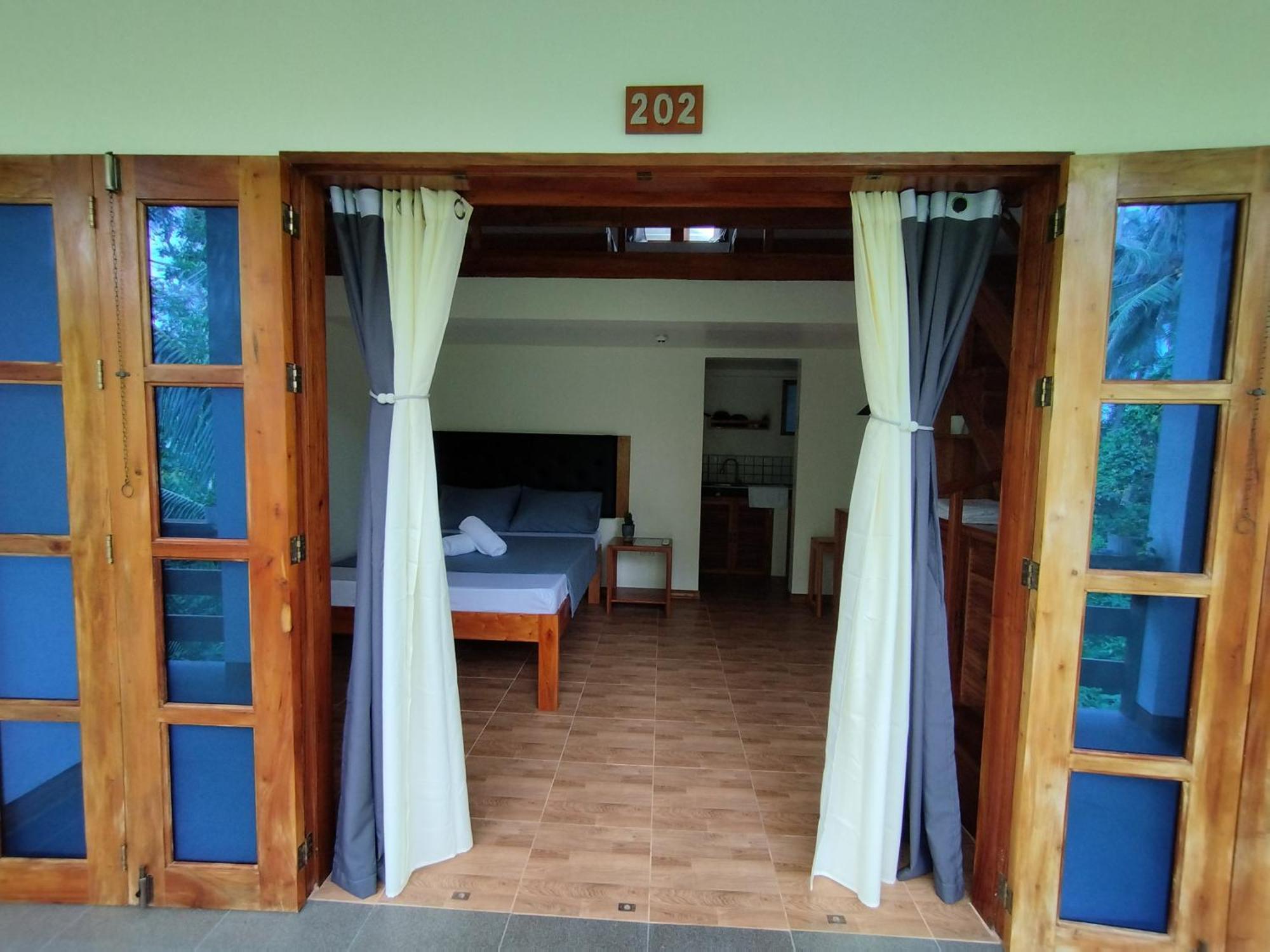 White Bada Guesthouse Siquijor Ruang foto